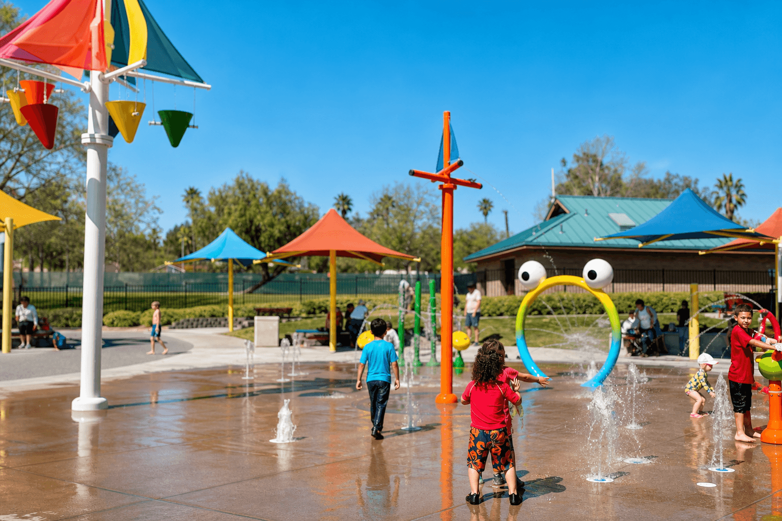 Children enjoying the eagle soar splashpad on a hot Temecula day.