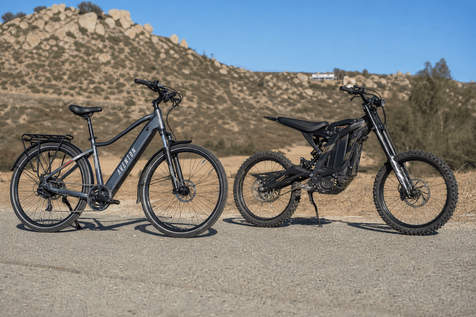 Side-by-side of a pedal-equipped electric bicycle and a high-powered Sur-Ron electric dirt bike.